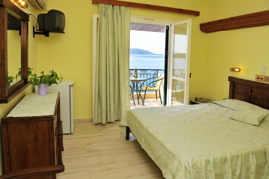Logan'S Beach Hotel Nydri  Quarto foto