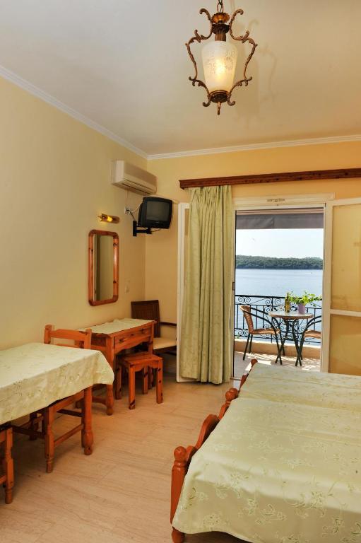 Logan'S Beach Hotel Nydri  Quarto foto
